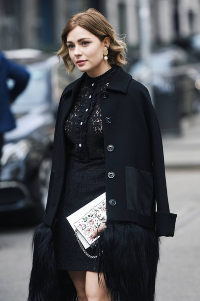 Milan, Italy - February 24, 2019: Street style outfit after a fashion show during Milan Fashion Week - MFWFW19 - Zdjęcie, obraz