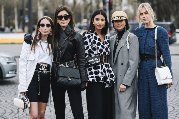 Paris, France - March 05, 2019: Street style outfit -  Models, bloggers and influencers with fashionable and stylish looking after a fashion show during Paris Fashion Week - PFWFW19 - Photo, Image