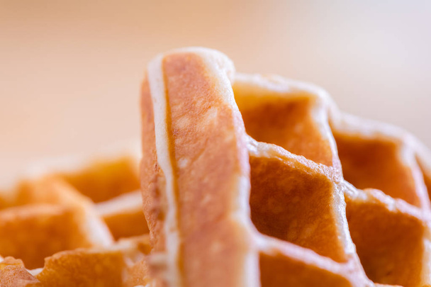 woman hands prepare waffle for serving process.waffle made from  - Photo, Image