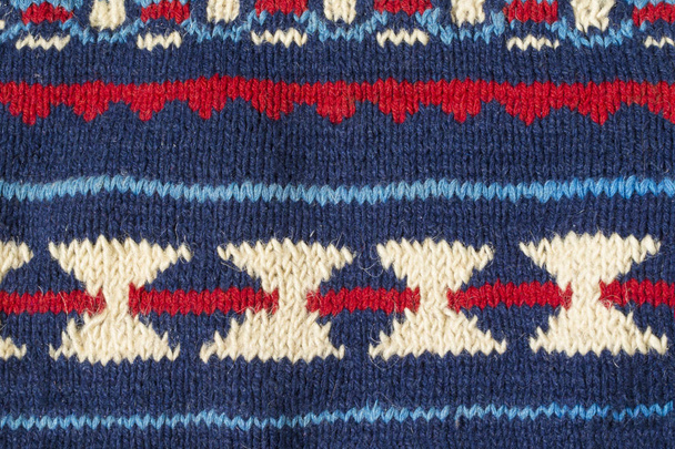 Texture tricotée avec motif bleu gros plan
 - Photo, image
