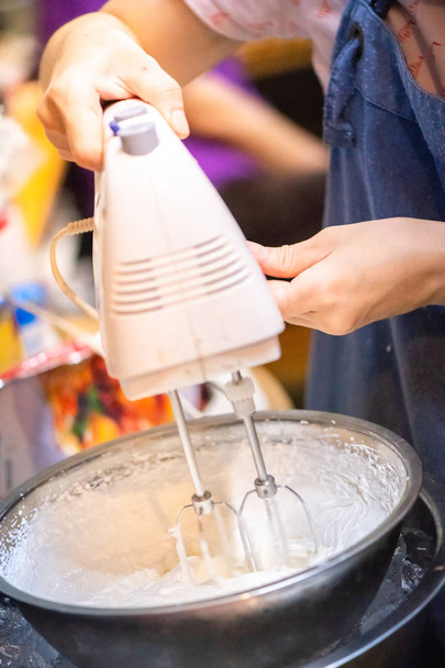 whipped cream cooking process.woman mixing Fresh cream for makin - Photo, Image