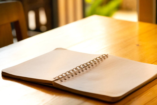 opened blank paper notebook.paper notebook on wooden desk.paper  - Photo, Image