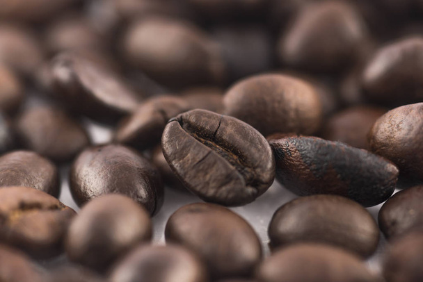 roasted coffee beans in white background ,close up - Photo, Image