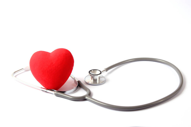 Stethoscope and heart on wood color background. Salud, medicina - Foto, Imagen