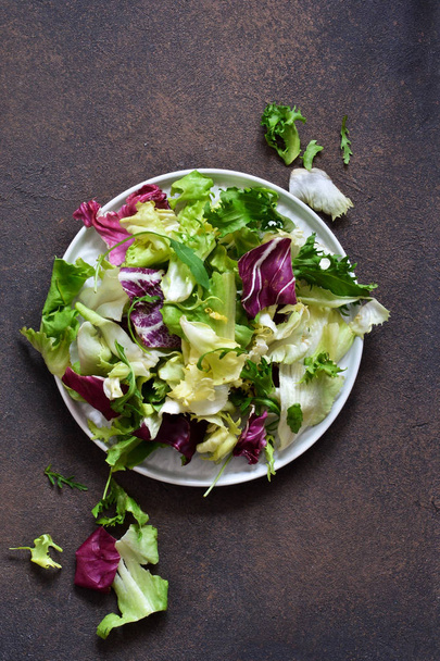 Fresh mix of salads: lettuce, arugula, spinach, mesclun, mache  - Photo, image