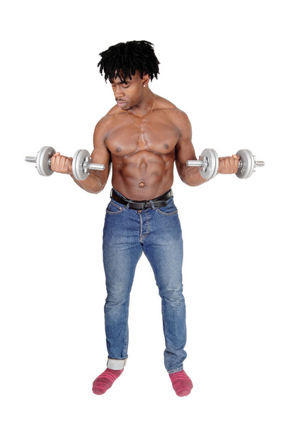 A black man working out with two dumbbell - Photo, Image