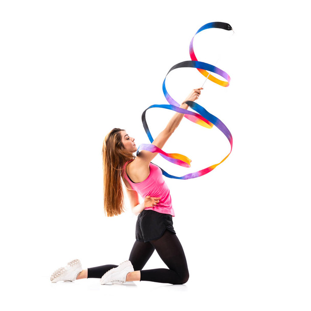 Girl doing rhythmic gymnastics with ribbon  - Fotografie, Obrázek