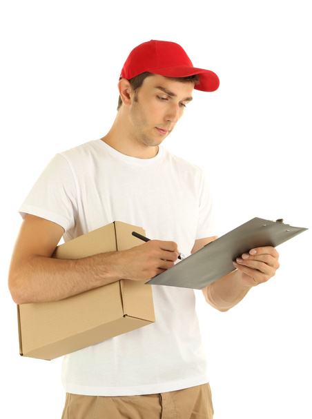 Young delivery man holding parcel and clipboard, isolated on white - Fotoğraf, Görsel