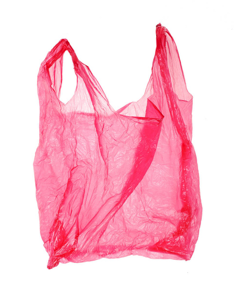 Red-pink plastic bag on white background. Isolated - Photo, Image