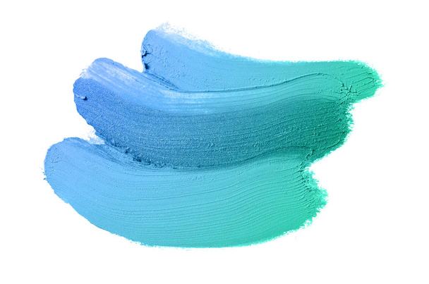Mancha y textura de lápiz labial o pintura acrílica aislada sobre fondo blanco. Color azul turquesa
 - Foto, Imagen