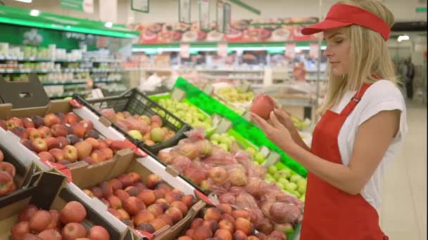 Woman Specialist in Food Quality and Health Control Checking Apple - Záběry, video