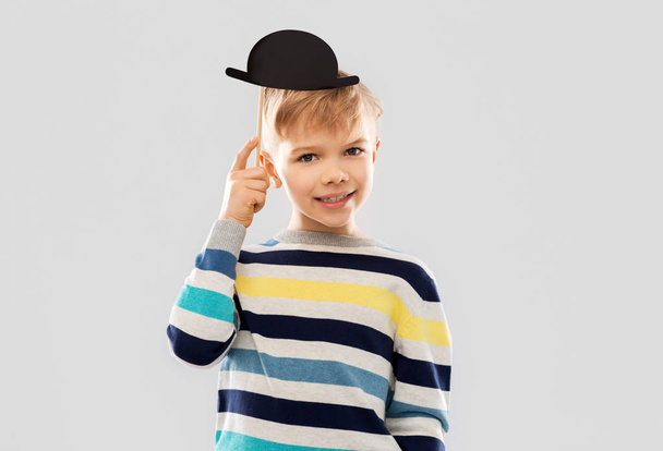 smiling boy with black vintage bowler hat - Foto, Imagen