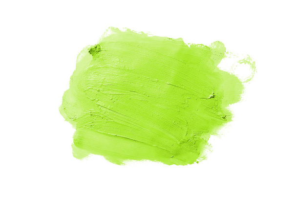 Smear and texture of lipstick or acrylic paint isolated on white background. Light green color - Fotografie, Obrázek