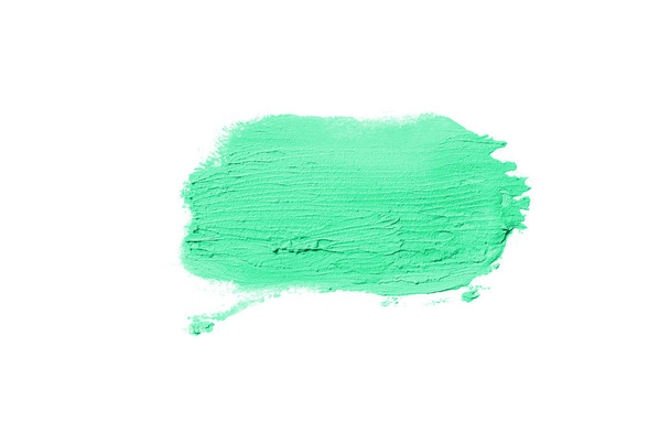 Mancha y textura de lápiz labial o pintura acrílica aislada sobre fondo blanco. Color turquesa
 - Foto, Imagen