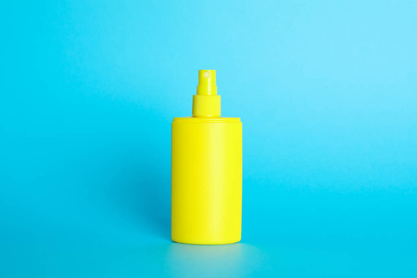 Sunscreen spray on color background, space for text - Photo, image