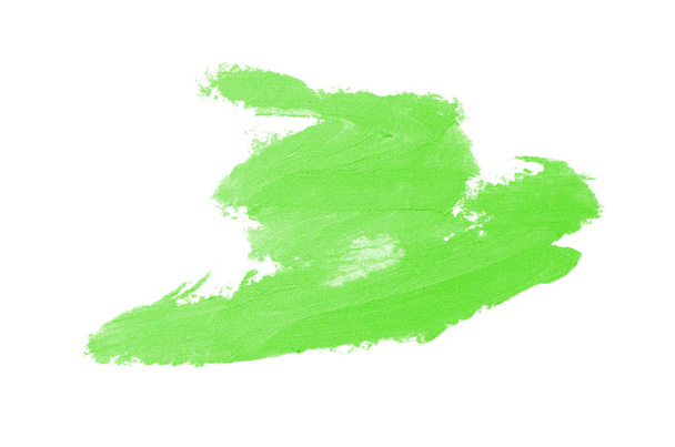 Επίχρισμα και υφή του κραγιόν ή ακρυλικό χρώμα απομονώνονται σε λευκό φόντο. Δείγμα βερνικιού με κραγιόν ή υγρό βερνίκι νυχιών. Στοιχείο για την ομορφιά καλλυντικό σχεδιασμό. Πράσινο χρώμα - Φωτογραφία, εικόνα