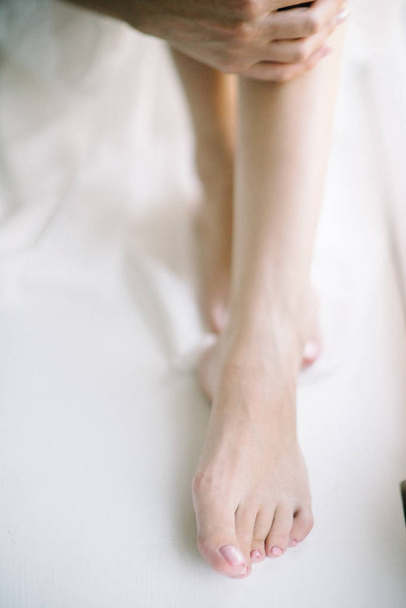 Female smooth shaved legs close up. Skin care - Foto, Imagem
