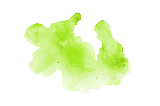 Abstract watercolor background image with a liquid splatter of aquarelle paint, isolated on white. Light green tones - Photo, Image