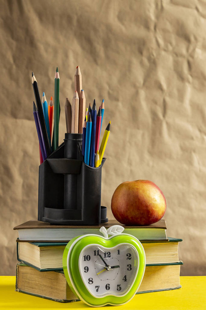 Back to school concept. Stack of books with school supplies - Photo, Image