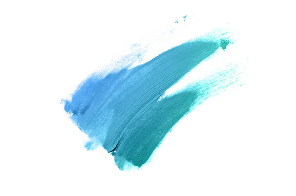 Mancha y textura de lápiz labial o pintura acrílica aislada sobre fondo blanco. Color azul turquesa
 - Foto, imagen
