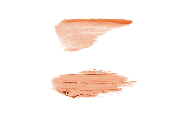 Roztěr a struktura rtěnky nebo akrylové barvy izolované na bílém pozadí. Oranžová barva - Fotografie, Obrázek