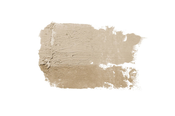 Rozmaz i tekstury szminki lub farby akrylowej na białym tle. Brązowy kolor - Zdjęcie, obraz
