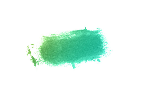 Abstrich und Textur von Lippenstift oder Acrylfarbe isoliert auf weißem Hintergrund. Lipgloss oder flüssiger Nagellack verwischen die Probe. Element für kosmetisches Schönheitsdesign. smaragdgrüne Farbe - Foto, Bild