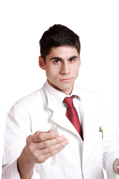 Doctor holding syringe - Fotó, kép