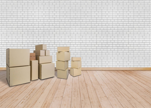 Moving in new home. Empty room with Carton boxes - Foto, Imagem