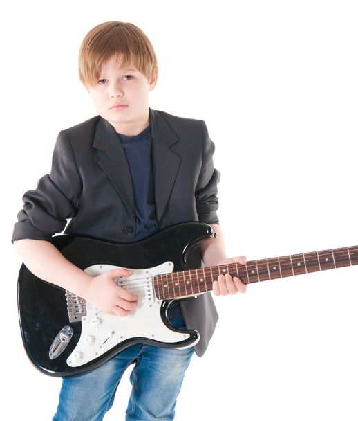 Handsome boy with electric guitar posing - Foto, imagen
