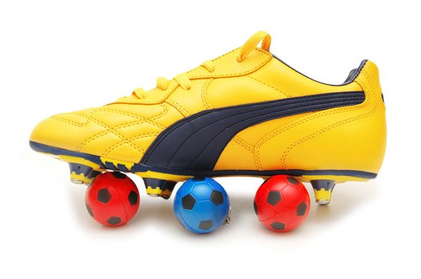 Yellow soccer footwear and footballs - Photo, Image