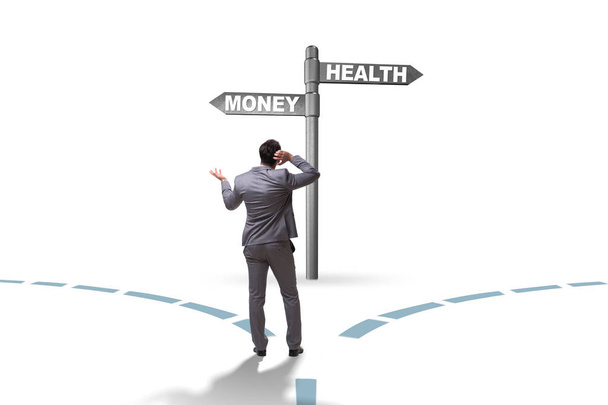 Homme d'affaires choisir entre l'argent et la santé - Photo, image