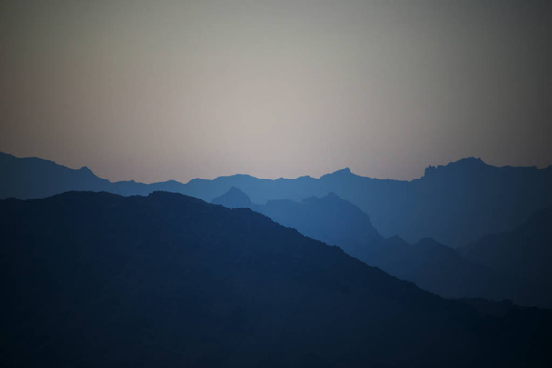 The misty peaks were at sunset - Photo, Image