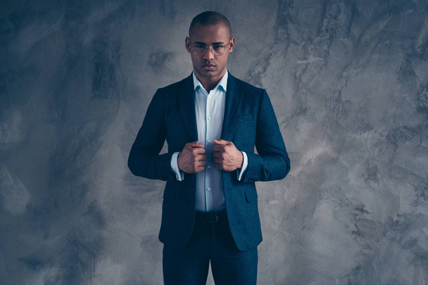 Portrait of gorgeous handsome trendy agent representative independent concentrated think thoughtful contemplation touch fashionable short hair bald blazer jacket isolated on dark background - 写真・画像