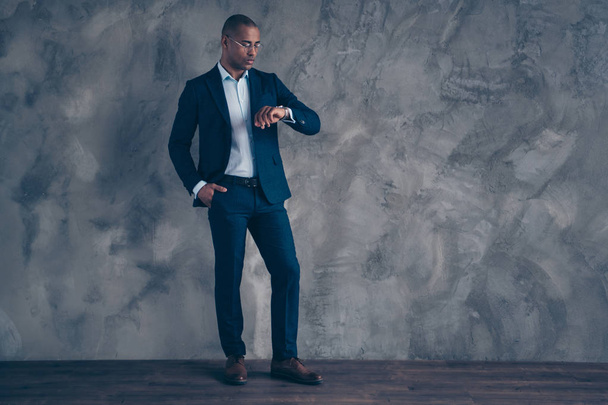 Full length body size view photo impatient smart cool financier finance manager short hair bald briefing wristwatch wait time put hands pocket trousers focused jacket isolated grey background - 写真・画像