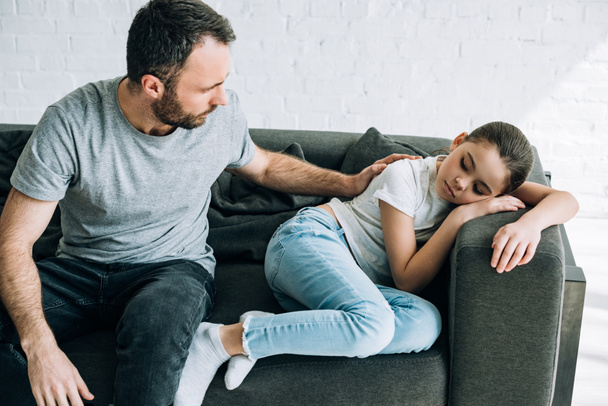 father and sad preteen daughter having conflict at home - Fotoğraf, Görsel