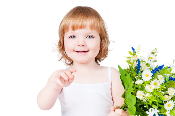 Beautiful little girl with flowers - Фото, зображення