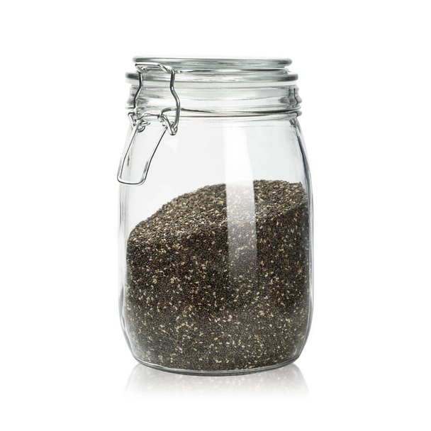 Chai seeds in clear jar isolated on white background. Natural grain for healthy eating. ( Clipping path ) - Foto, afbeelding