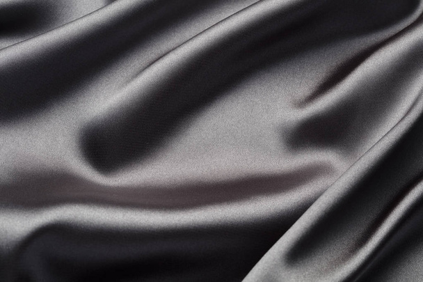 abstrakte, elegante Hintergrundtextur mit Wellen aus Seide, luxuriösem Stoff aus Satin - Foto, Bild
