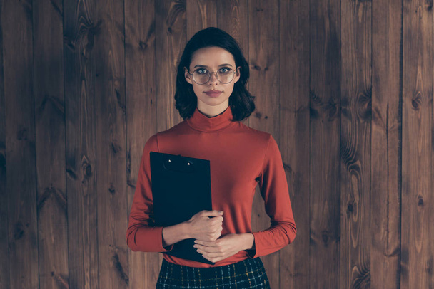Close up photo clever serious attractive freelancer hold hand analysis wear specs dressed red sweater checked skirt outfit hair hairstyle brunette stylish trendy interior  - Photo, Image