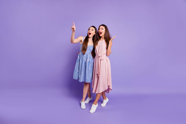 Full length body size view portrait of nice-looking charming attractive slim slender fit thin cheerful cheery positive emotional ladies dreaming about future isolated over pastel violet background - Foto, immagini