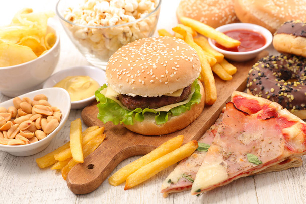 american food with hamburger, french fries, pizza - Foto, imagen