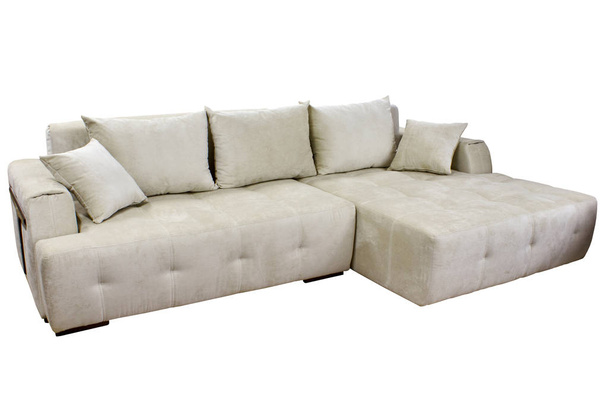 tyylikäs moderni valkoinen iso viihtyisä kangas sohva nurkkaan tyynyt valkoisella pohjalla
 - Valokuva, kuva