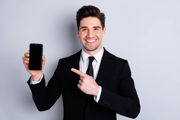 Portrait of handsome excited feel satisfied content agent want share ads adverts new product give feedback present option decision wear classic stylish outfit isolated on silver background - 写真・画像