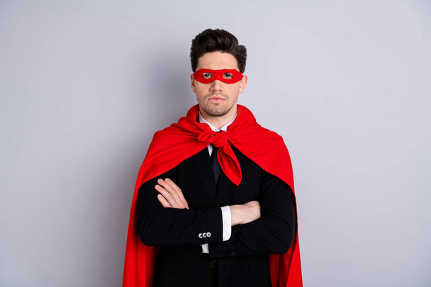 Portrait of his he nice attractive incognito best perfect great excellent ideal guy wearing bright superman look outfit mantle folded arms accessory isolated over light gray background - Foto, immagini