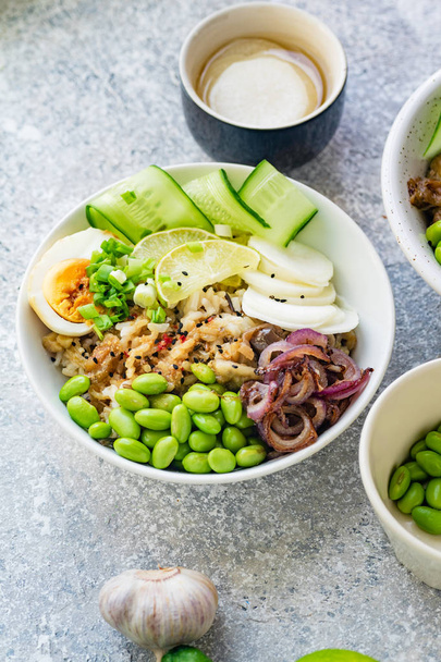 Vegetarian dishes with marinated egg and edamame beans in bowls  - Fotografie, Obrázek