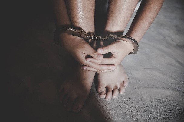 Child hands in handcuffs, Stop violence against children - Photo, Image