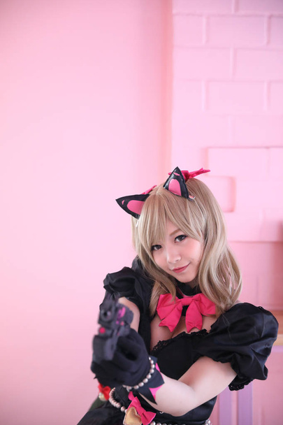 japan anime cosplay, porträt von mädchen cosplay in rosa zimmer zurück - Foto, Bild