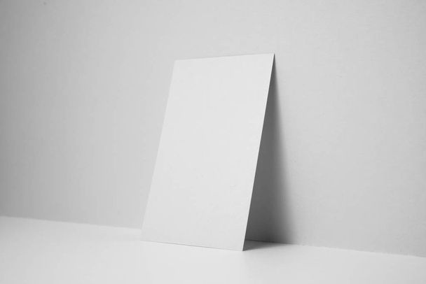 Blank business card on white background for mockup. - Foto, afbeelding