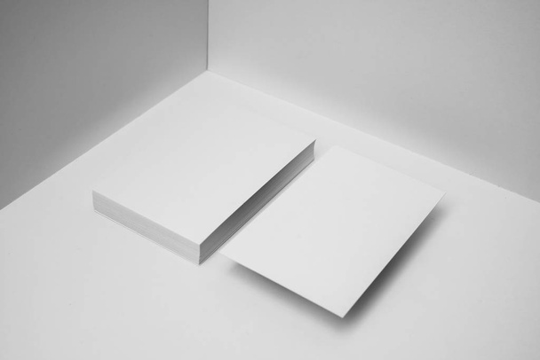 Blank business cards on white background for mockup. - Photo, image